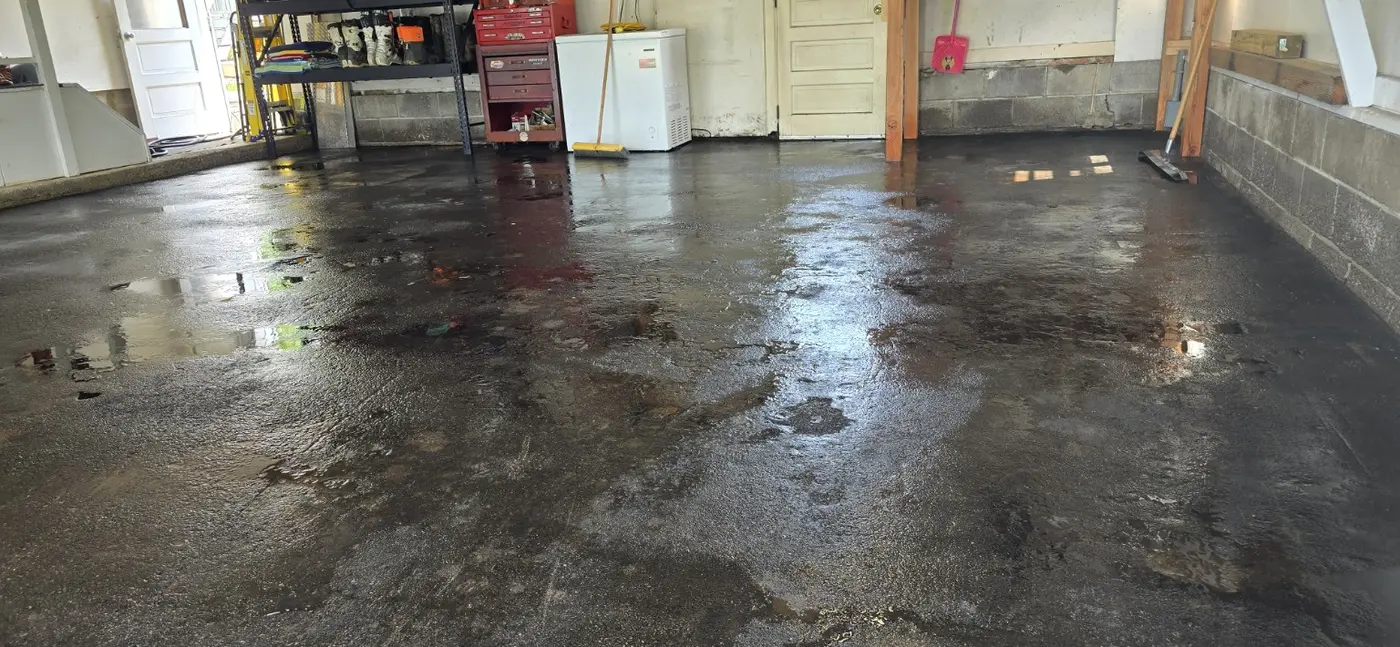 Garage concrete immediately after cleaning, still wet