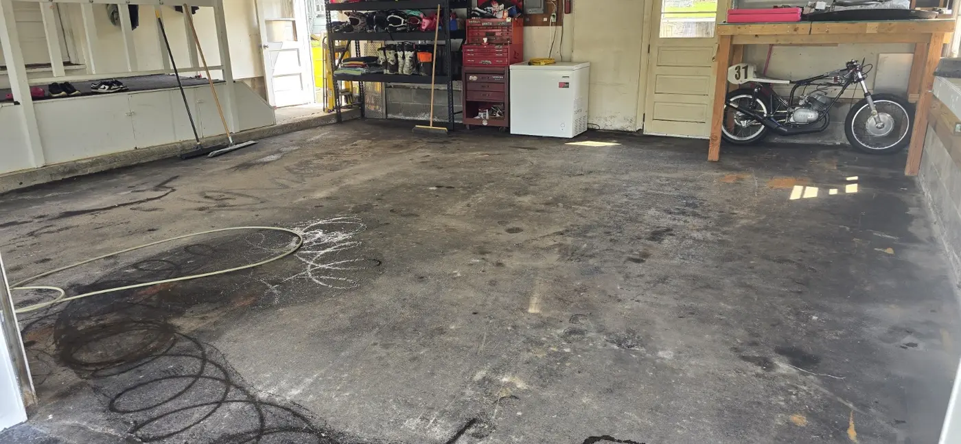 Dirty garage concrete before equipment testing