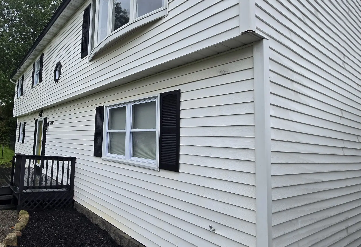Finished front siding and trim after house washing