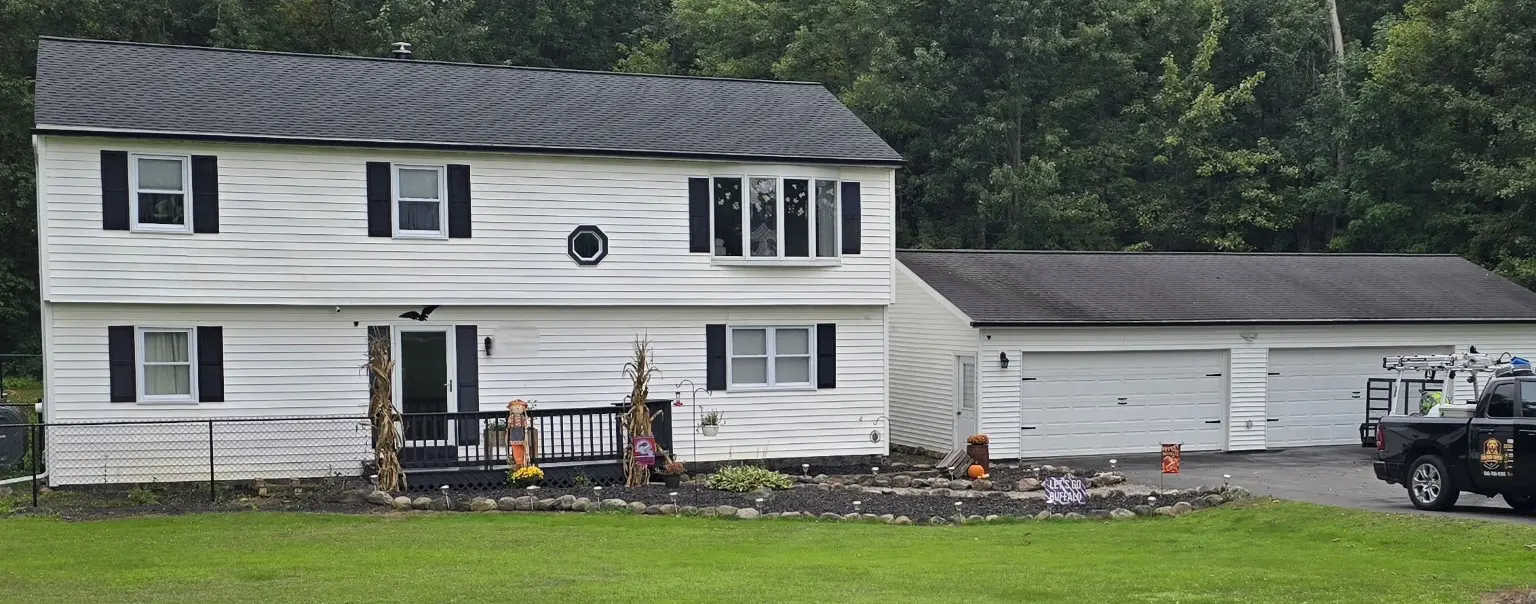 Wide view of the completed Walworth home and Golden Touch service truck